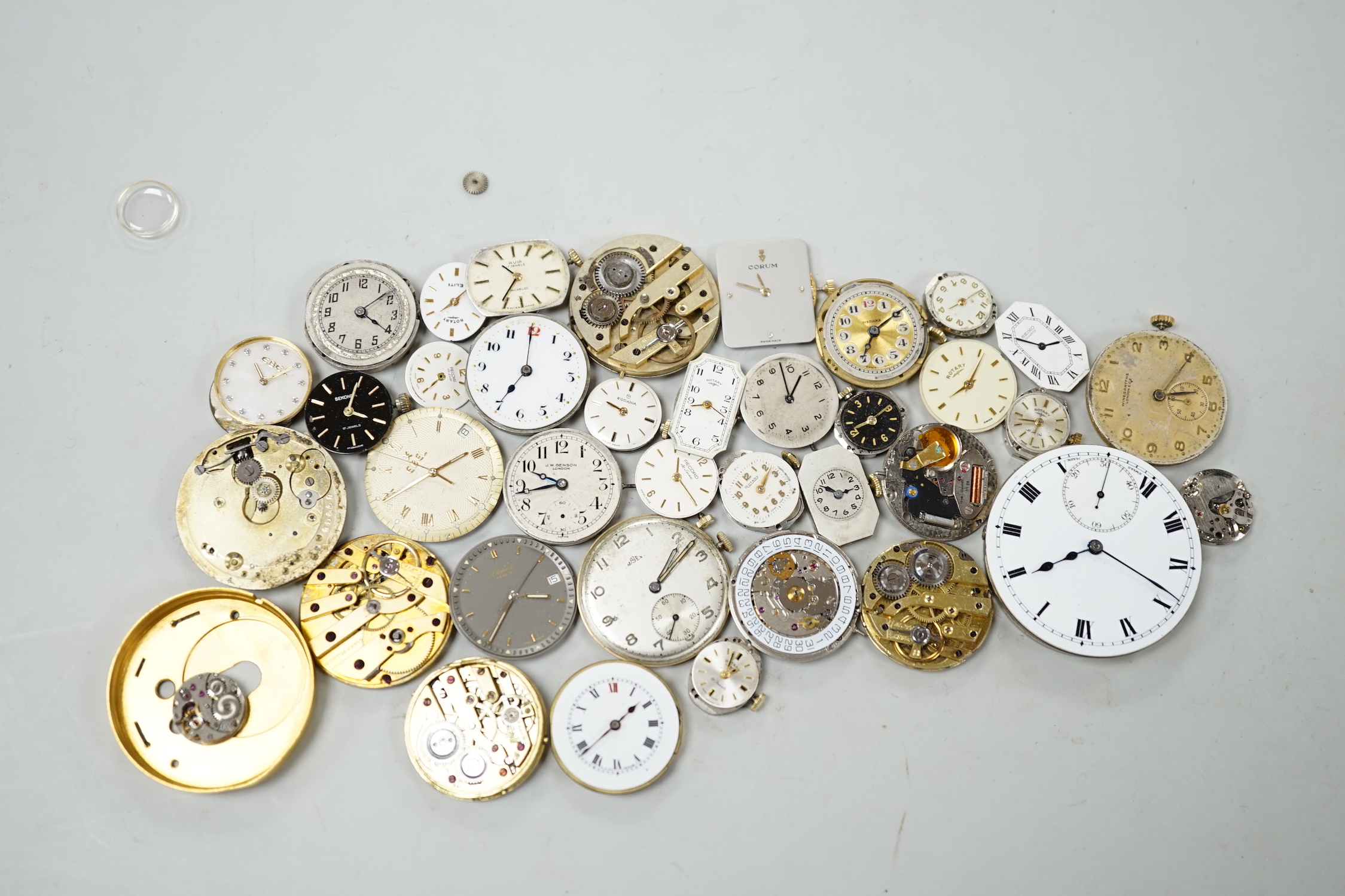 A quantity of assorted wrist and pocket watch parts and movements.